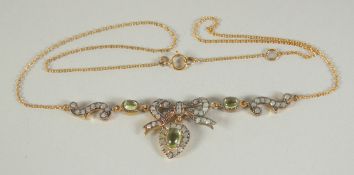 A 9CT GOLD SILVER SET PERIDOT AND DIAMOND NECKLACE.