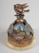 AN INTERESTING FRENCH CIRCULAR BELL with fruiting vines and three landscape scenes. 3.5ins