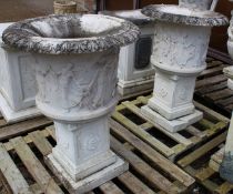 A GOOD PAIR OF CARVED ITALIAN WHITE MARBLE URNS ON PEDESTAL BASES. 100cm high.
