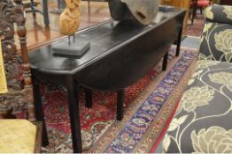 AN EBONISED WAKE TABLE. 8ft 3ins long 1ft 3ins deep.