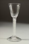 AN 18TH CENTURY ENGLISH WINE GLASS with inverted bowl and air twist stem. 5.5ins high.