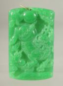 A GOLD TOP JADE PENDANT.