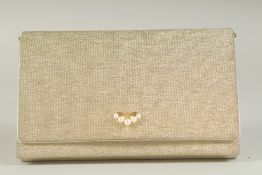 A MIKIMOTO GINZA TOKYO GOLD COLOURED AND PEARL EVENING BAG, 7.5ins long.