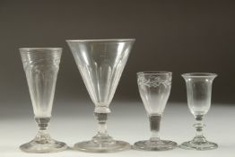 FOUR VARIOUS 18TH CENTURY ENGLISH WINE GLASSES, various heights.