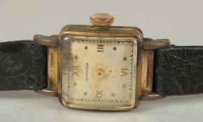 A LADIES LONGINES WRISTWATCH with leather strap