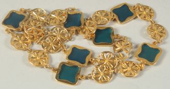 AN ALHAMBRA GILT NECKLACE 24ins long.