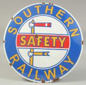 A SOUTHERN RAILWAY ENAMEL SIGN. 14ins diameter.