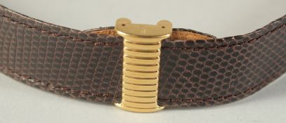 A BOUCHERON TAN LEATHER WATCH STRAP