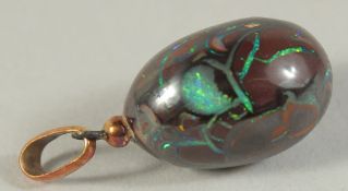 AN EGG PENDANT.