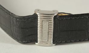 A BOUCHERON BLACK LEATHER WATCH STRAP.