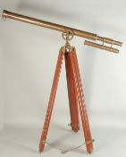 A LARGE TELESCOPE on a stand.