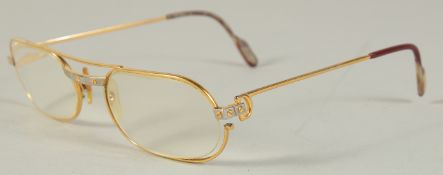 A CARTIER, PARIS, GOLD SPECTACLES, stamped, Cartier, Paris, 59 14, in a leather case.
