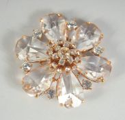 A LARGE CHANEL SIX PETAL FLOWER BROOCH with diamante. Signed, 5.5cm diameter in a Chanel box.