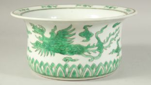 A CHINESE FAMILLE VERTE PORCELAIN BASIN decorated with dragons and stylised clouds. 27.5 cm
