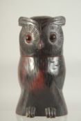A BLACK FOREST TYPE CARVED WOOD OWL TOBACCO JAR with hinged head. 9ins high.