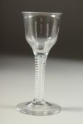 AN 18TH CENTURY ENGLISH WINE GLASS with inverted bowl and air twist stem. 5.5ins high.