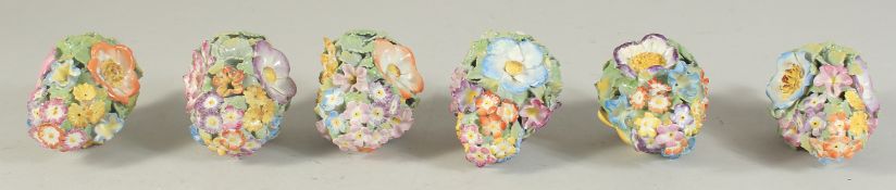 A GOOD SET OF SIX MEISSEN PORCELAIN FLOWER ENCRUSTED TREE DECORATIONS. 3.75ins long.