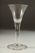 AN 18TH CENTURY ENGLISH WINE GLASS with tapering bowl. 6.5ins high.