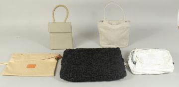 A KIPLING WHITE BAG, A BRIGS NIGHT BAG, A BLACK MUFF AND TWO SMALL BAGS. (5)