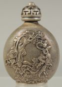 A CHINESE WHITE METAL SNUFF BOTTLE AND COVER. 3ins.