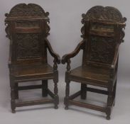 A GOOD PAIR OF MOSTLY 17TH - EARLY 18TH CENTURY OAK WAINSCOT CHAIRS with carved backs, bog oak inlay