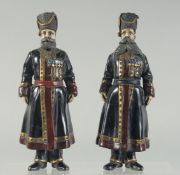 A PAIR OF RUSSIAN BRONZE GILDED FIGURES. 17cm high.