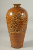 A CHINESE BROWN GLAZE JIZHOU VASE WITH RAISED DRAGON DECORATION. 30.5 cm high.