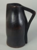 A VERY GOOD 18TH CENTURY LEATHER BLACKJACK. 1ft high.