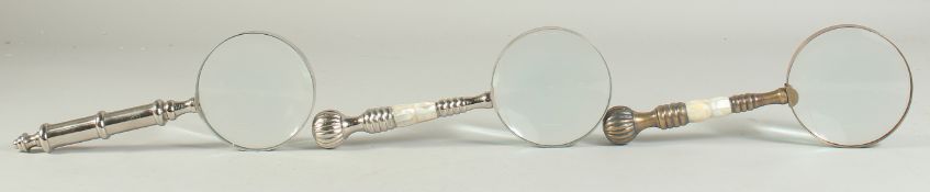 THREE MAGNIFYING GLASSES.