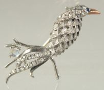 A SMALL DIAMOND AND MOONSTONE BROOCH.