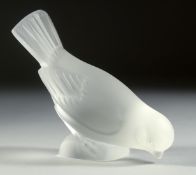 A LALIQUE FROSTED GLASS BIRD, wings open Signed, Lalique, France. 5.25ins long.