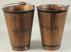 A PAIR OF BOLLINGER WOODEN ICE BUCKETS with metal handles. 16ins high.