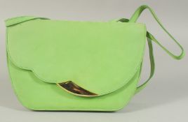 AN ESCADA, ITALY, GREEN SUEDE BAG, 9.5ins long with long strap.