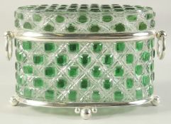 A GOOD CUT GLASS OVAL CASKET with ring handles. 14ins high.