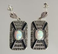 A PAIR OF SILVER OPAL AND ONYX ART DECO STYLE EARRINGS.