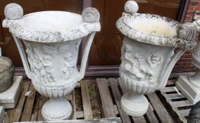 A LARGE AND IMPRESSIVE PAIR OF ITALIAN CARVED WHITE MARBLE TWIN HANDLED, one repaired. 4ft high (