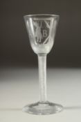 A RARE 18TH CENTURY ENGLISH JUSTICE ADMIRAL BYNG WINE GLASS engraved with a hanged man and