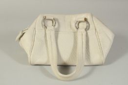 A MARC JACOBS GREEN LEATHER BAG, 8ins long with a pair of leather handles.