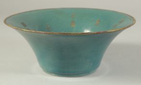 A CHINESE TURQUOISE GLAZE BOWL with incised characters. 22 cm diameter.