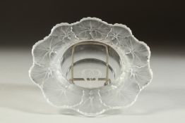 A LALIQUE CIRCULAR DISH, the sides with flowers. Etched Lalique, France, bears Lalique label. 5.5ins