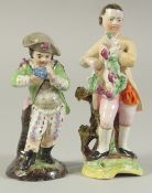 A STAFFORDSHIRE FIGURE OF A BOY AND A CONTINENTAL FIGURE OF A BOY both carrying grapes (2). 5.5ins x