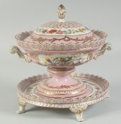 A SEVRES STYLE PINK TUREEN, COVER AND STAND on four claw feet.