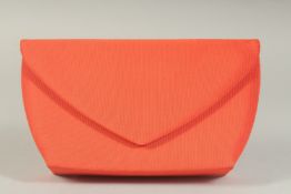 A G Y ITALIAN ORANGE FABRIC EVENING BAG, 8ins long with rope strap.