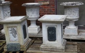 A GOOD PAIR OF CARVED ITALIAN WHITE MARBLE CAMPAGNA URNS ON PEDESTAL BASES, the urns 3ft 3ins