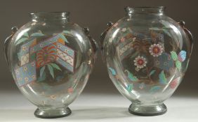A GOOD PAIR OF ART DECO GLASS VASES with enamel decoration. 7ins high.