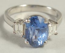 A SUPERB PLATINUM, NATURAL SAPPHIRE AND DIAMOND RING, with G I A certificate.