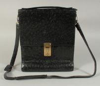 A MADDLER ZURICH BLACK CROCODILE SKIN BAG (USED) 9ins long, 11ins high.