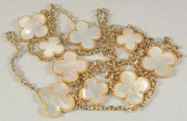 AN ALHAMBRA GILT AND MOTHER OF PEARL NECKLACE, 40ins long.