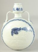 A CHINESE BLUE AND WHITE TWIN HANDLE MOON FLASK, decorated to each side with a bird. 29.5ins high.