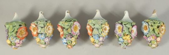 A GOOD SET OF SIX MEISSEN PORCELAIN FLOWER ENCRUSTED TREE DECORATIONS. 3.75ins long.